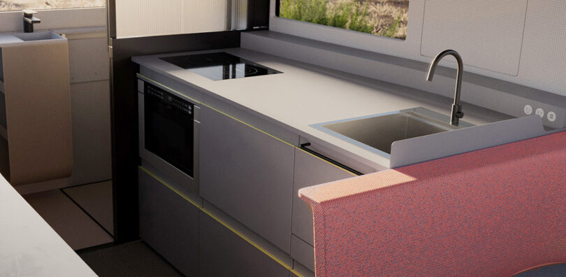 Interior render of Lightspeed L1 trailer showing seating and surfaces, including cooking burner and sink.