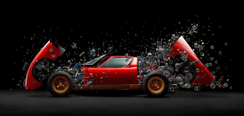 image of an exploded red sports car with parts suspended
