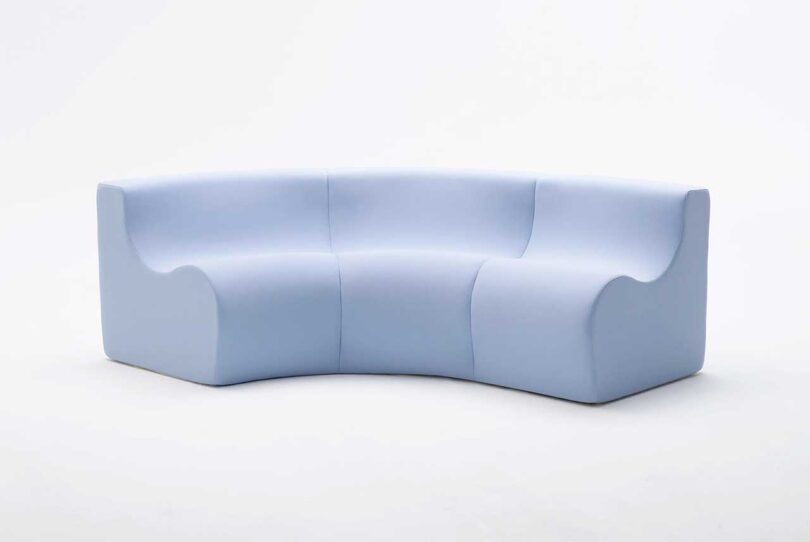 light blue three-seater sofa on a white background