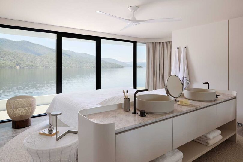 angled view of modern white bedroom on houseboat