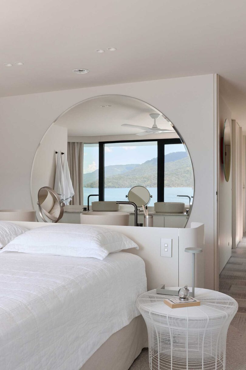 angled view of modern white bedroom on houseboat