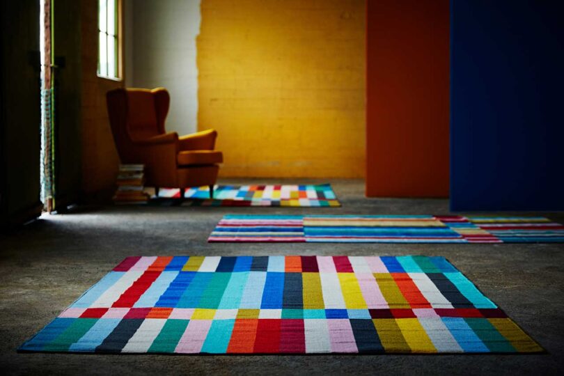 colorful geometric floor rug in a styled interior space