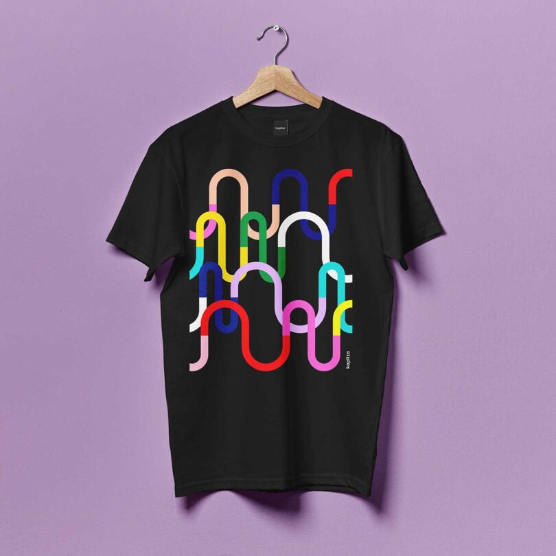 t-shirt with a colorful graphic design of colorful curves on a black background