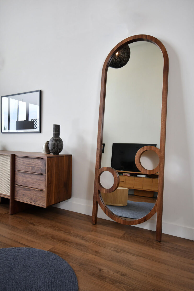 walnut console table and standing floor mirror