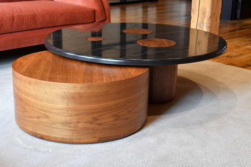two nesting wood and grey marble coffee tables