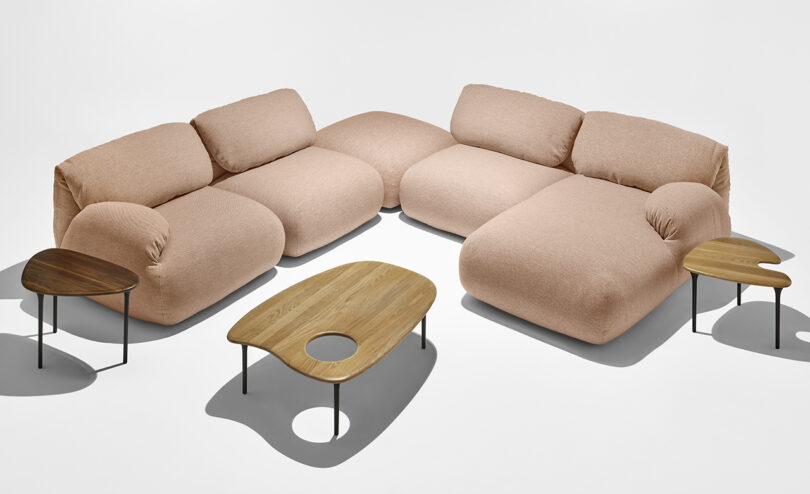 light pink modular sofa and nesting tables