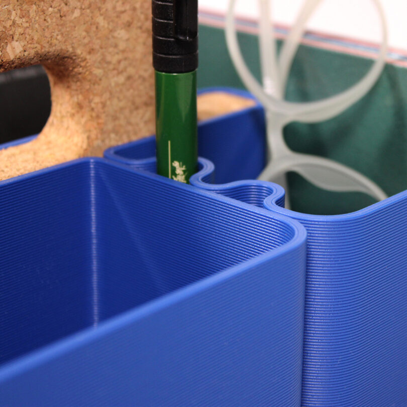 detail of cobalt blue 3D printed desk organizer