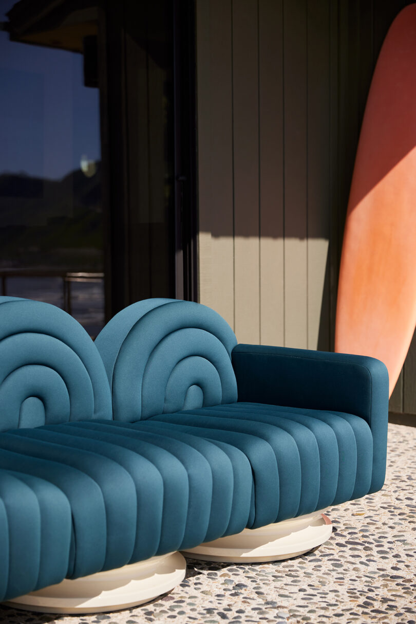 blue outdoor channel tufted sofa