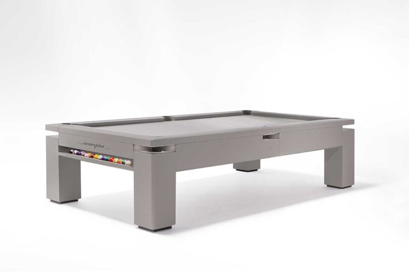 angled set view of grey pool table