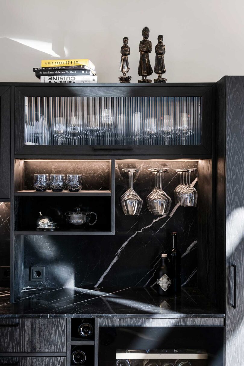 closeup of black cabinets in modern kitchen