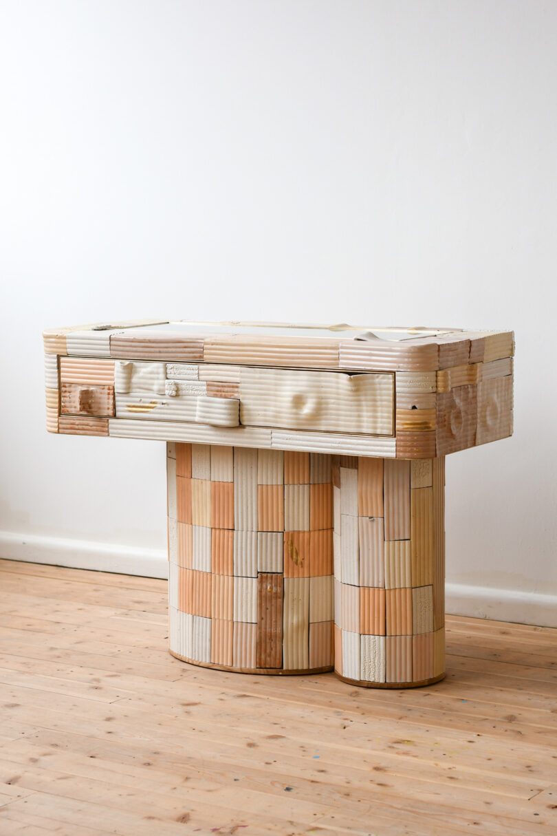 console table made of wood scraps
