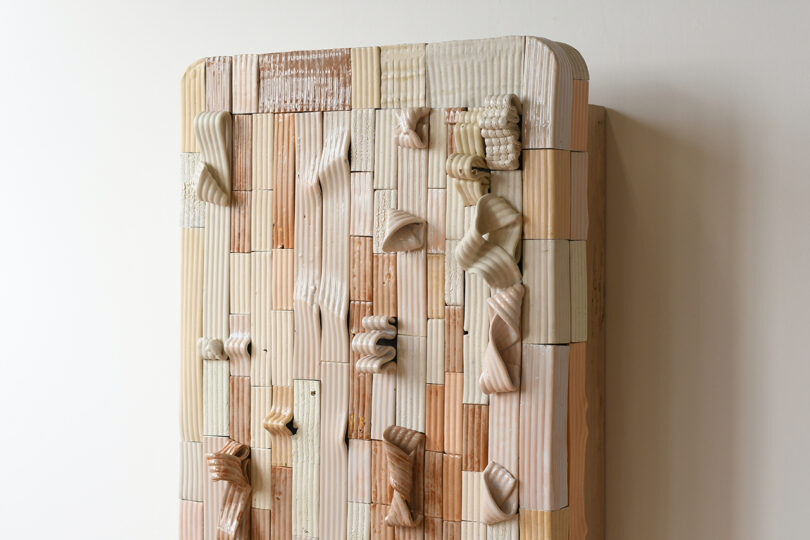 hanging wall cabinet made from wood scraps