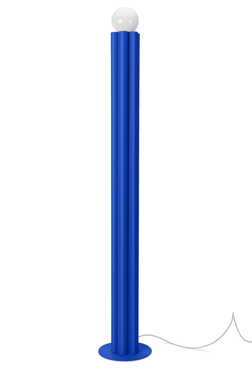 fluted cobalt blue floor lamp on a white background