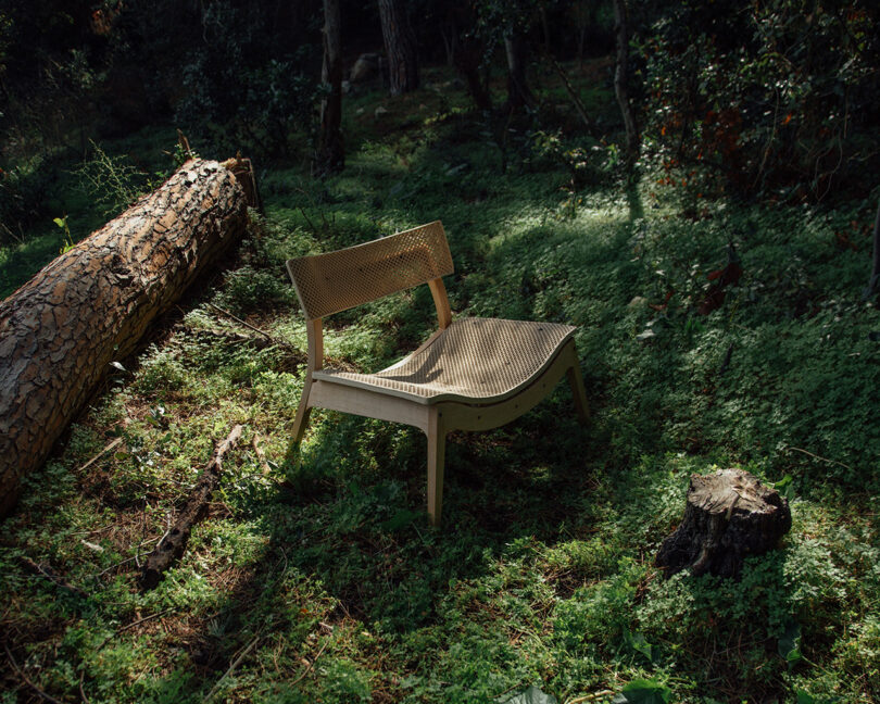 low-slung chair made using wood waste and 3D printing