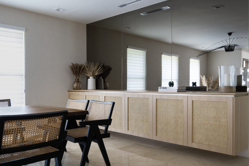 Dining area with wall trim and neutral tones