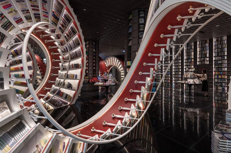 intricately curved staircases and bookshelves