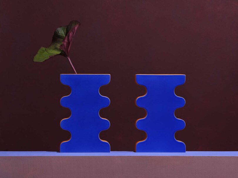 two cobalt blue geometric vases