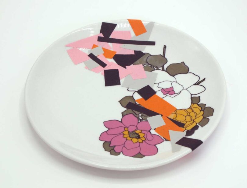 angled down view of colorful flower plate with confetti like repairs