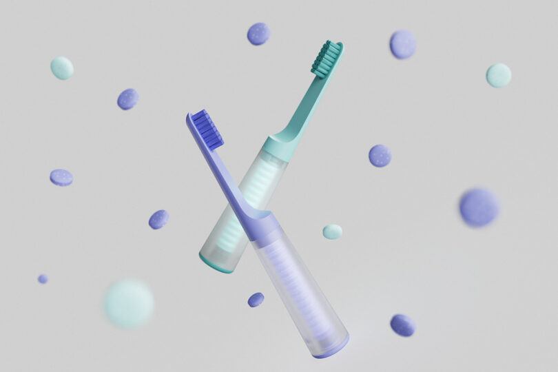 Optional blueberry and lagoon versions of the one&done toothbrush rendered in 3D floating the air with toothpaste tablets.