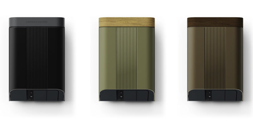 Three Home 7, Home 7 Plus, and Home 22 Plus Simpson and Partners EV chargers shown side by side. The left model is in all black, middle is in forest green with a birch wood top, and the furtherest right unit is in an olive finish with dark wood top.