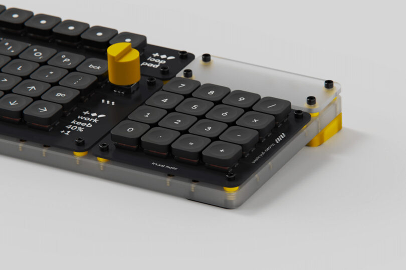 Close up of numeric keypad attached onto Creator Board XL keyboard on its right side, with yellow rotary dial attached to Loop Pad.