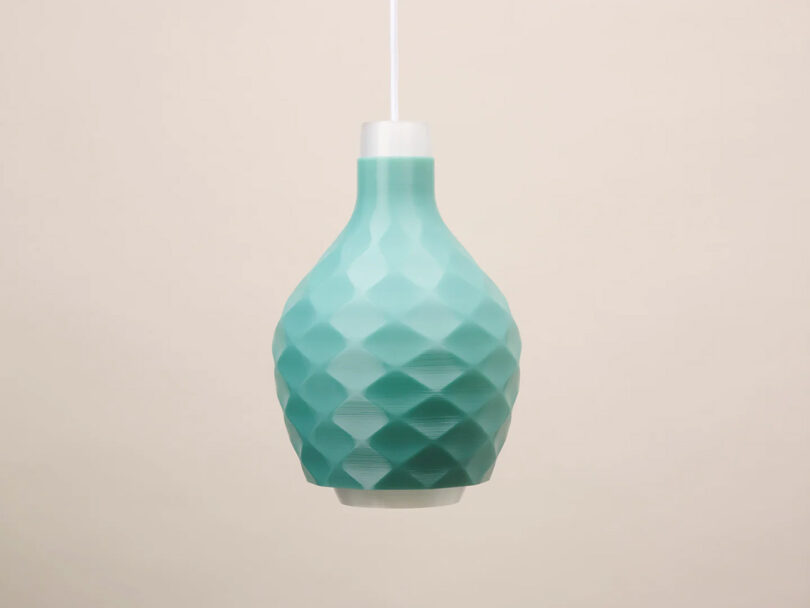Side view of the Droplet Three Pendant light designed by Aleksandra Gaca and made using 3D printing technology. 