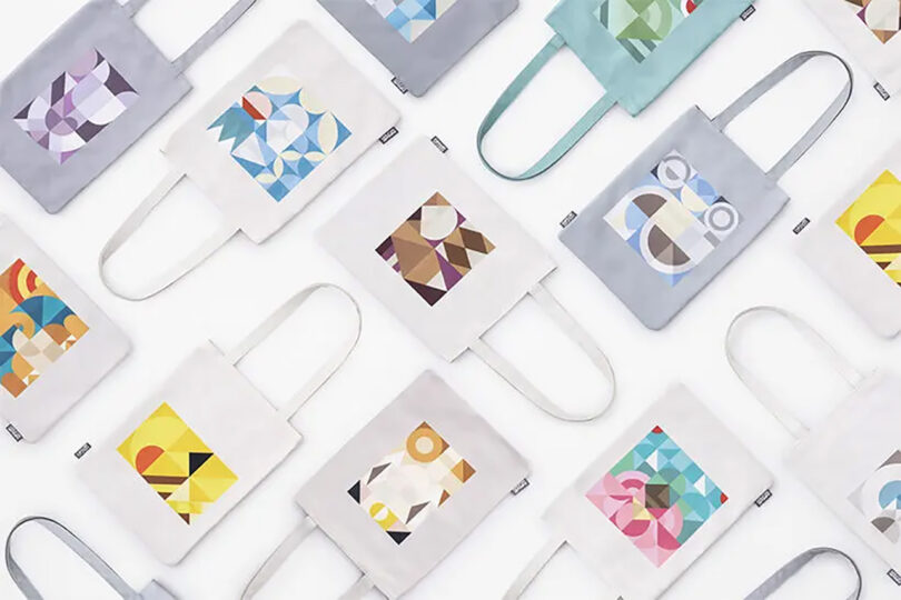 A grid of Pokemon Mosaic tote bags positioned in alternating angles with their straps extended.