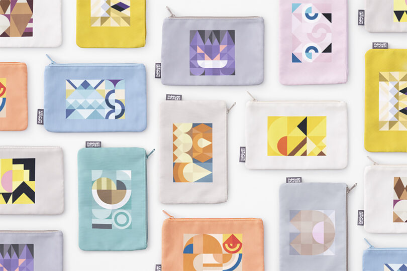 A grid arrangement of pouches from the Pokemon Mosaic collection with varying abstract designs derived from the colors of the Pokemon bestiary.