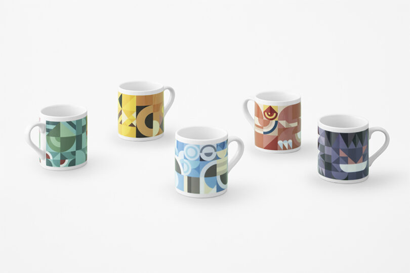Five coffee mugs from the Pokemon Mosaic collection pillows with varying abstract designs derived from the colors of the Pokemon bestiary.