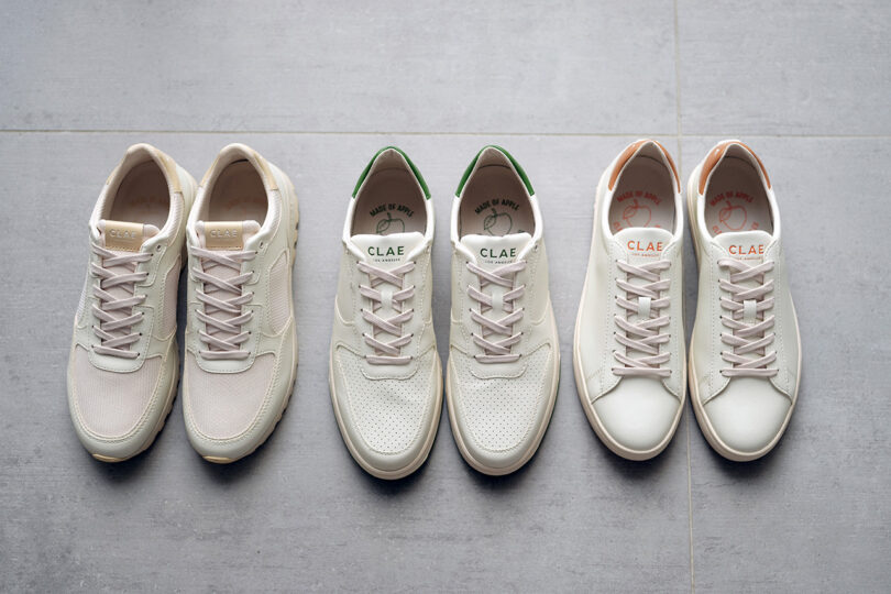 Three pairs of CLAE Appleskin sneakers in Bradley, Malone and Joshua styles set against concrete flooring.