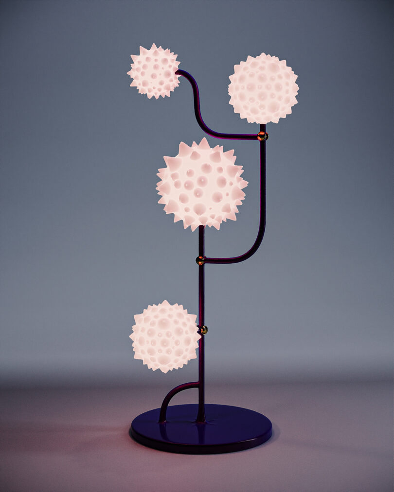 floor lamp with four spiky orbs at the end of its arms