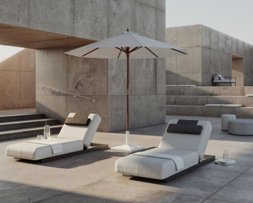 two outdoor chaise lounges with thick cushions