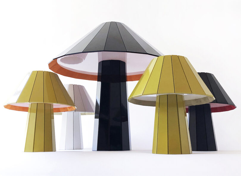 selection of mushroom shaped table lamps in black, white, and chartreuse