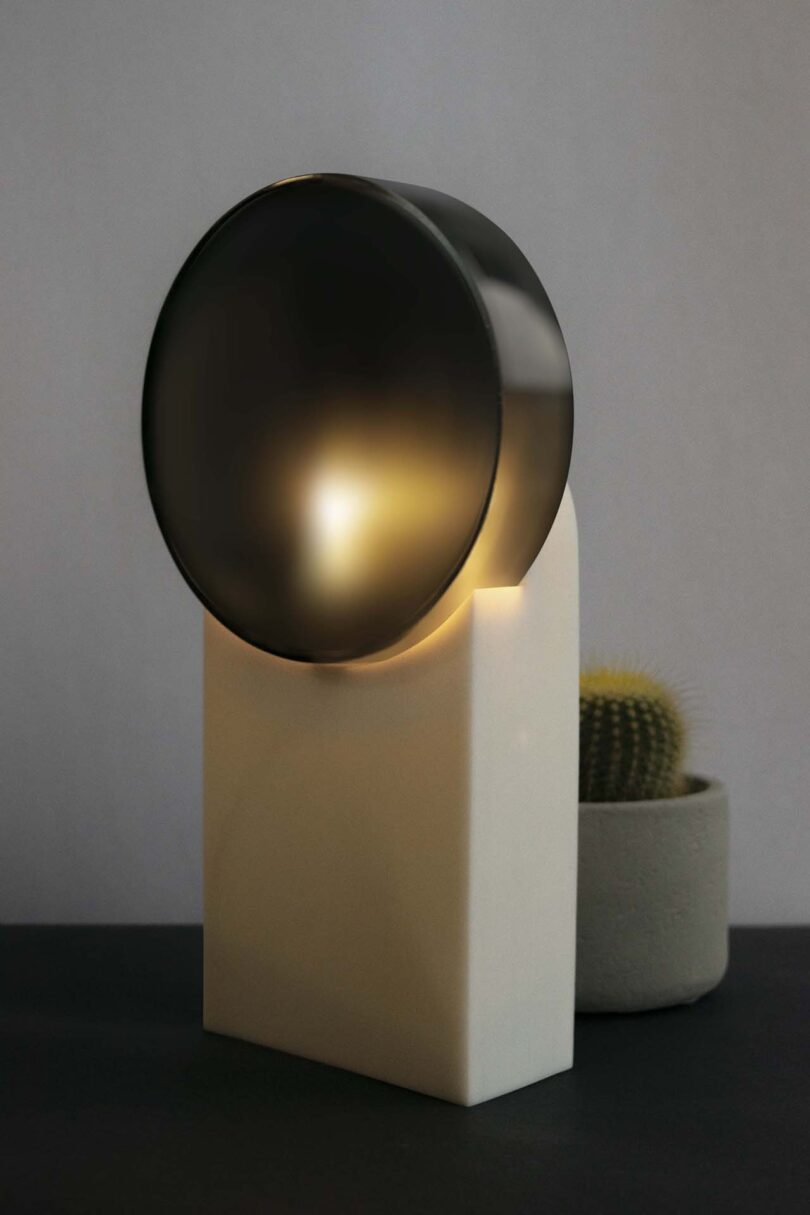 grey table lamp with circular head
