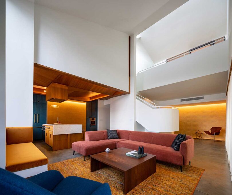 angled interior view of modern living room with double height ceilings