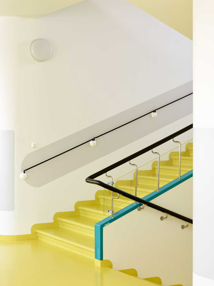 neon yellow, turquoise, and grey staircase