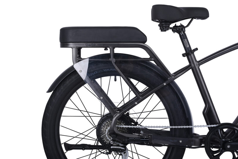 grey e-bike with rear seat on white background