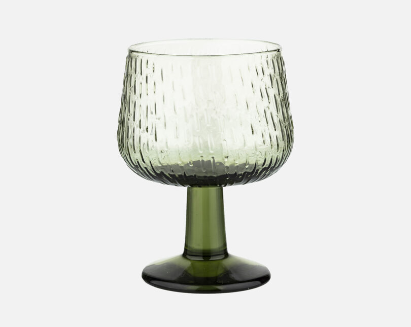 clear glass goblet on white background