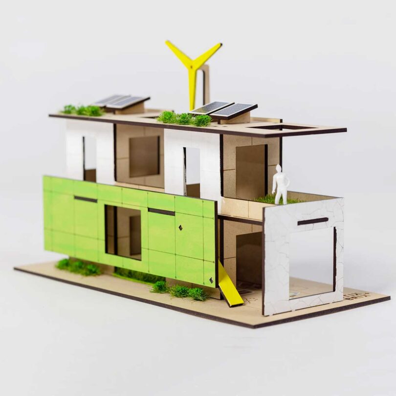 angled view of model making kit of assembled modern house
