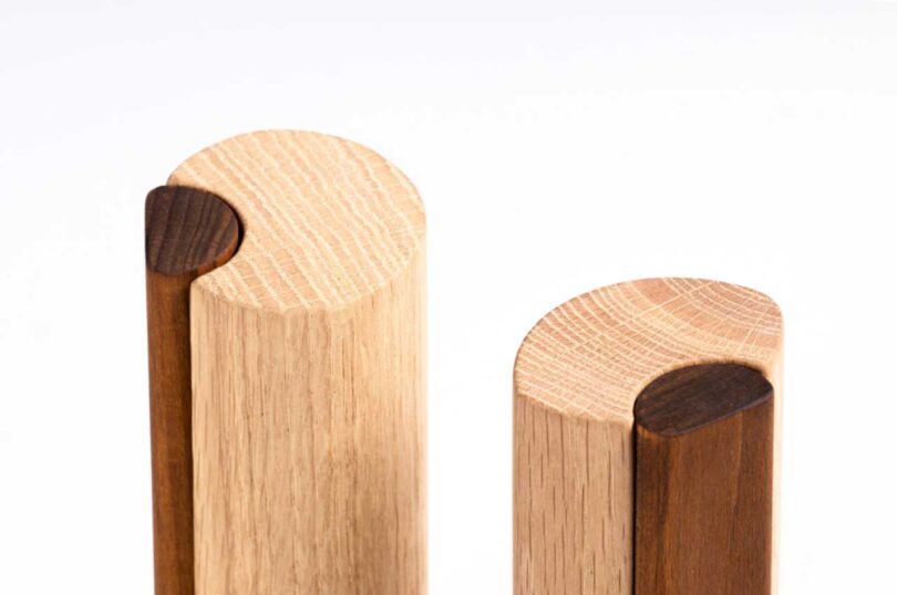 closeup of tops of two-tone wood spice shakers