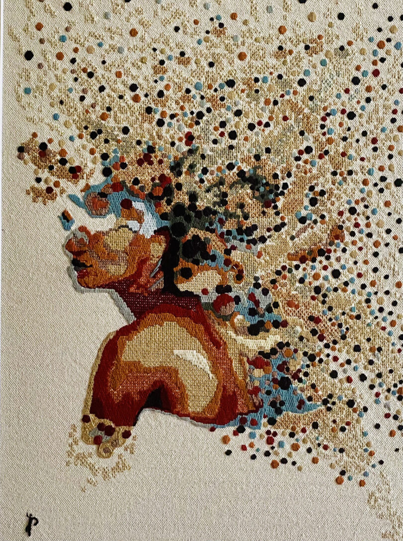 textile painting of a brown-skinned person