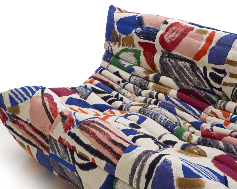 modular low seating upholstered in a colorful mural print