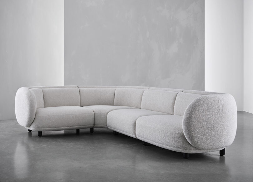 white modular couch in a styled space