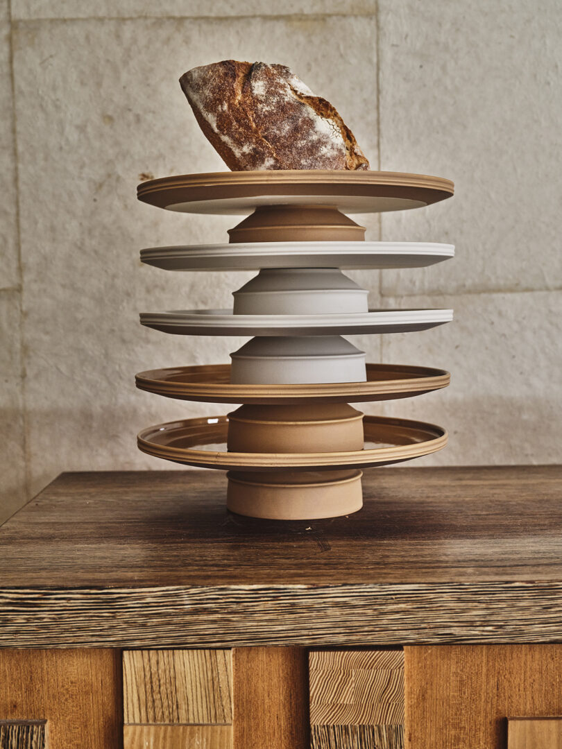 stacked white and terracotta raised dishes