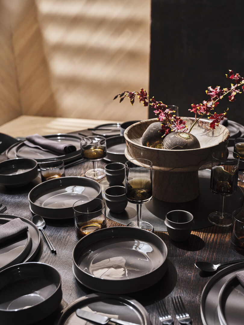 styled table set with black tableware