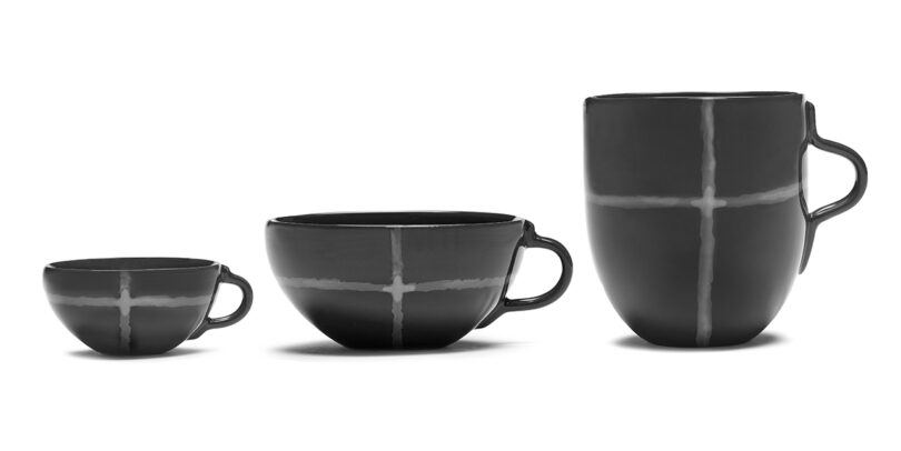black and grey grid pattern cups and mugs on a white background