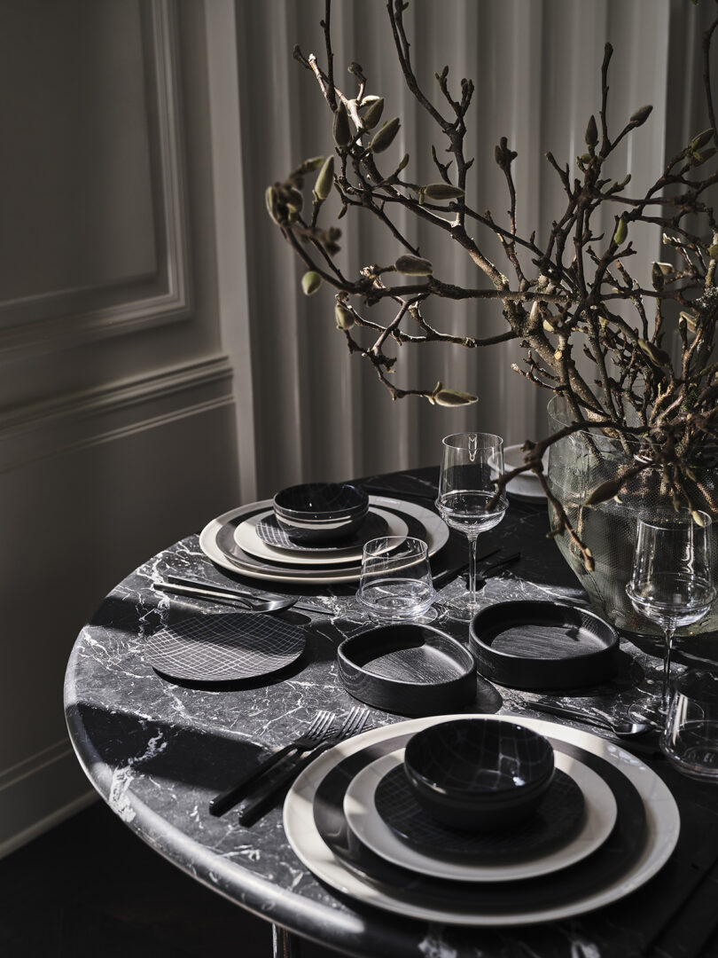 styled table set with black and white tableware