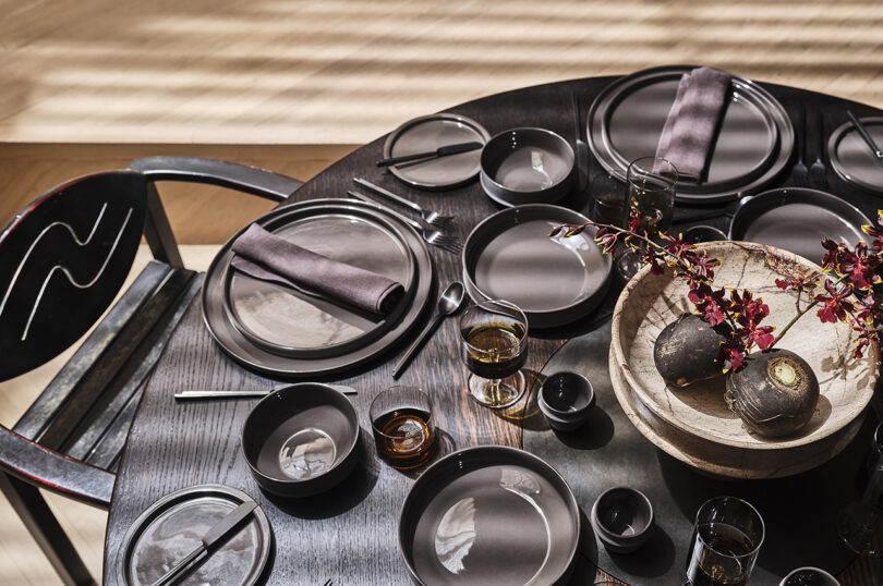 styled table set with black tableware