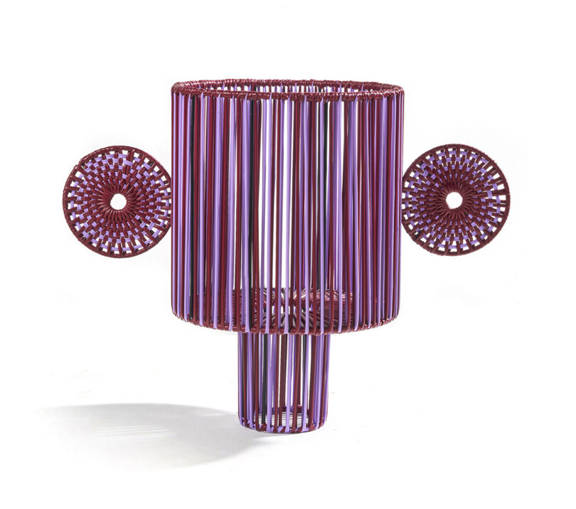 purple woven vase on white background