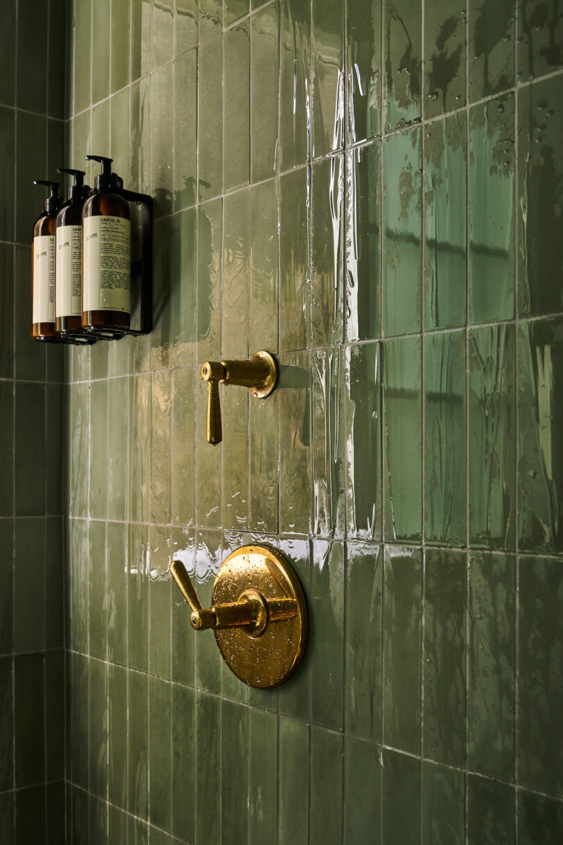 Green bathroom tiles in shower